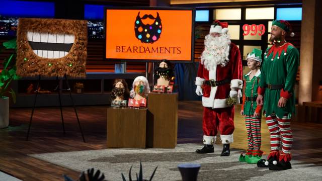 Jason McOmber with Santa Claus and an Elf on the Shark Tank to increase Beardaments Net Worth